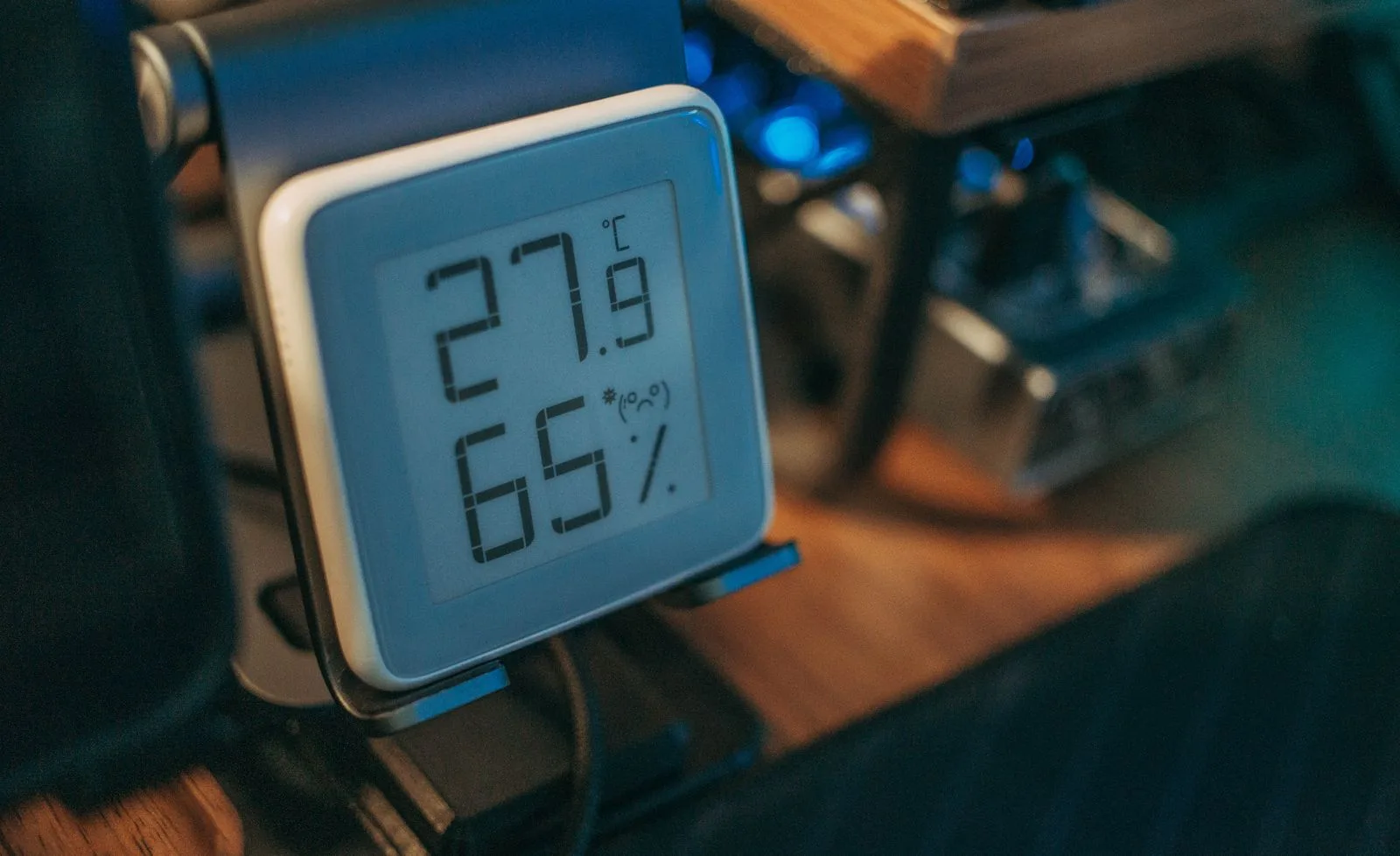 Digital hygrometer showing 65% relative humidity
